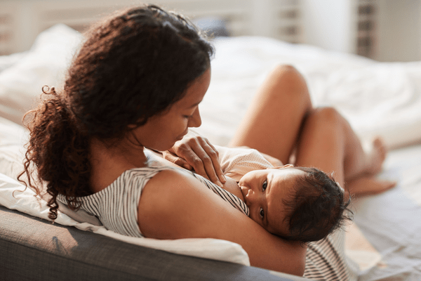 Mother breastfeeding a young baby